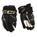 CCM Tacks XF Black/Gold Junior Hokikesztyűk 10 hüvelyk