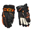 CCM Tacks XF Black/Orange Junior Hokikesztyűk 11 hüvelyk